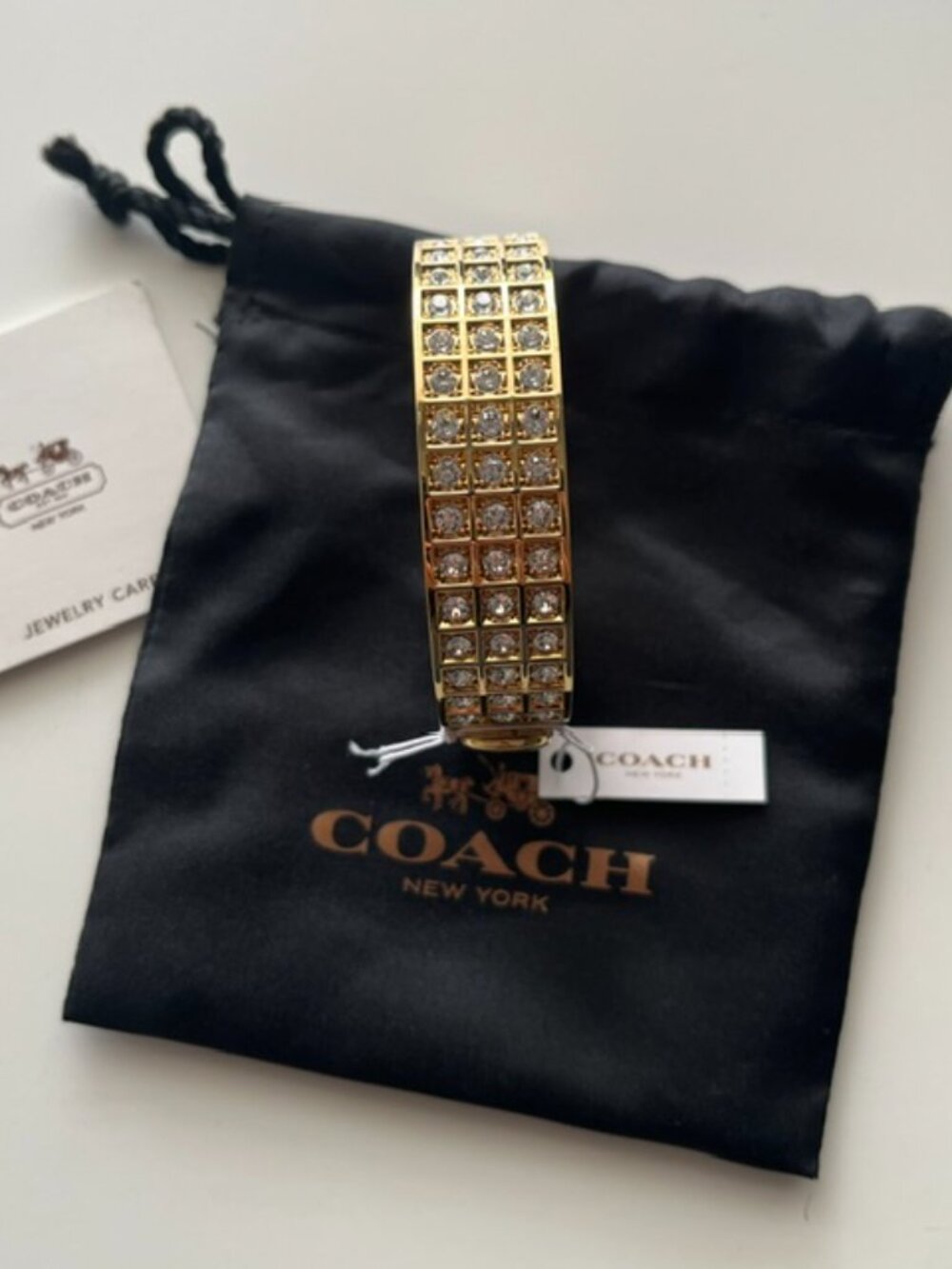 COACH Gold Bangle Bracelet, Signature C Embossed - Picture 3 of 5